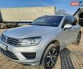 Сірий Фольксваген Туарег, об'ємом двигуна 3 л та пробігом 240 тис. км за 21900 $, фото 1 на Automoto.ua