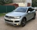 Серый Фольксваген Туарег, объемом двигателя 3 л и пробегом 136 тыс. км за 11500 $, фото 1 на Automoto.ua