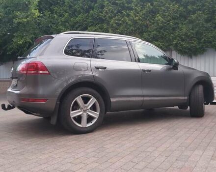 Сірий Фольксваген Туарег, об'ємом двигуна 3 л та пробігом 84 тис. км за 28331 $, фото 1 на Automoto.ua