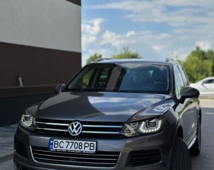 Серый Фольксваген Туарег, объемом двигателя 3 л и пробегом 262 тыс. км за 22000 $, фото 2 на Automoto.ua