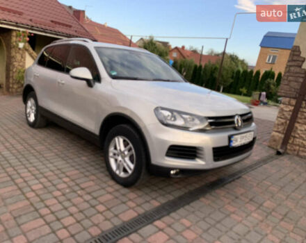 Серый Фольксваген Туарег, объемом двигателя 2.97 л и пробегом 300 тыс. км за 17200 $, фото 2 на Automoto.ua