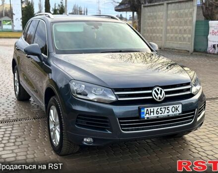 Сірий Фольксваген Туарег, об'ємом двигуна 3 л та пробігом 229 тис. км за 20999 $, фото 1 на Automoto.ua