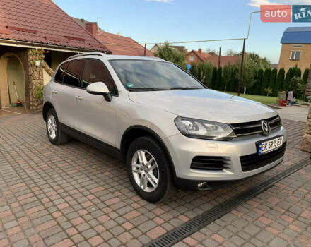 Серый Фольксваген Туарег, объемом двигателя 2.97 л и пробегом 300 тыс. км за 17200 $, фото 1 на Automoto.ua