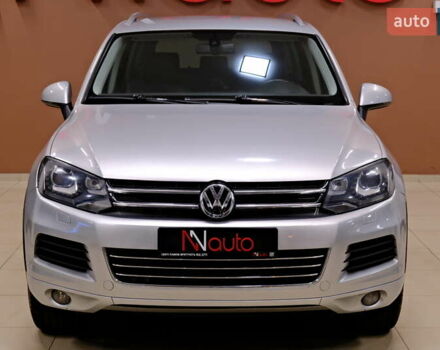 Серый Фольксваген Туарег, объемом двигателя 3 л и пробегом 219 тыс. км за 17900 $, фото 1 на Automoto.ua