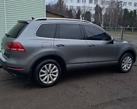 Серый Фольксваген Туарег, объемом двигателя 3 л и пробегом 267 тыс. км за 17500 $, фото 1 на Automoto.ua