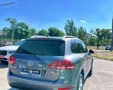 Сірий Фольксваген Туарег, об'ємом двигуна 3 л та пробігом 225 тис. км за 18500 $, фото 4 на Automoto.ua