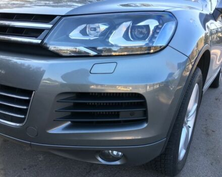 Серый Фольксваген Туарег, объемом двигателя 3 л и пробегом 80 тыс. км за 29264 $, фото 1 на Automoto.ua