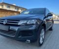Сірий Фольксваген Туарег, об'ємом двигуна 3 л та пробігом 87 тис. км за 13700 $, фото 1 на Automoto.ua