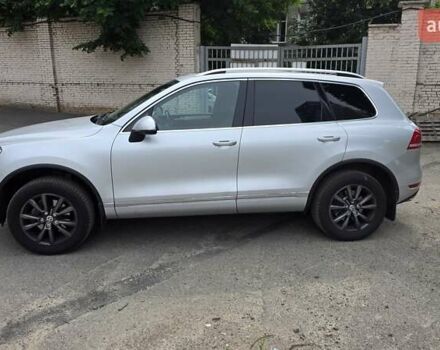 Серый Фольксваген Туарег, объемом двигателя 3 л и пробегом 275 тыс. км за 20500 $, фото 1 на Automoto.ua