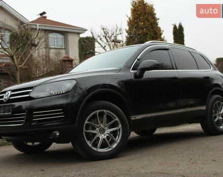 Серый Фольксваген Туарег, объемом двигателя 2.97 л и пробегом 183 тыс. км за 19900 $, фото 1 на Automoto.ua