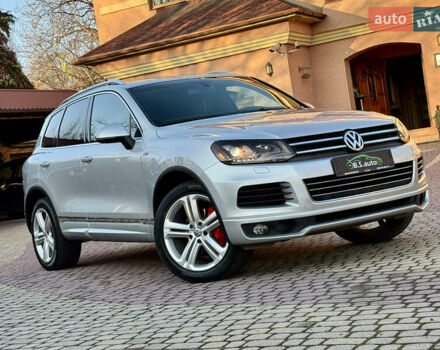 Серый Фольксваген Туарег, объемом двигателя 3 л и пробегом 250 тыс. км за 20500 $, фото 2 на Automoto.ua