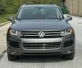 Серый Фольксваген Туарег, объемом двигателя 3.6 л и пробегом 83 тыс. км за 10000 $, фото 1 на Automoto.ua