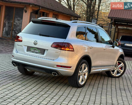 Серый Фольксваген Туарег, объемом двигателя 3 л и пробегом 250 тыс. км за 20500 $, фото 1 на Automoto.ua