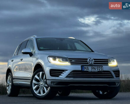 Серый Фольксваген Туарег, объемом двигателя 3 л и пробегом 205 тыс. км за 27500 $, фото 2 на Automoto.ua