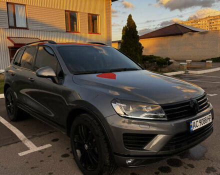 Серый Фольксваген Туарег, объемом двигателя 2.97 л и пробегом 220 тыс. км за 23500 $, фото 1 на Automoto.ua