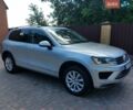 Серый Фольксваген Туарег, объемом двигателя 3 л и пробегом 160 тыс. км за 23200 $, фото 1 на Automoto.ua