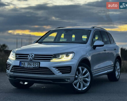 Серый Фольксваген Туарег, объемом двигателя 3 л и пробегом 205 тыс. км за 27500 $, фото 1 на Automoto.ua