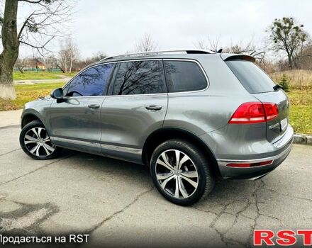 Серый Фольксваген Туарег, объемом двигателя 3 л и пробегом 109 тыс. км за 31500 $, фото 2 на Automoto.ua