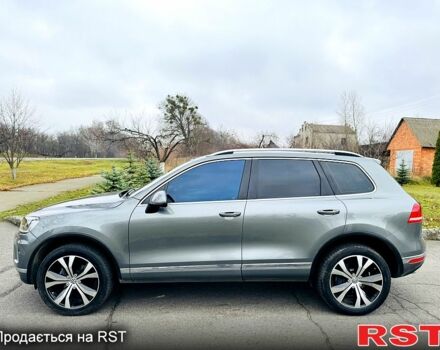 Серый Фольксваген Туарег, объемом двигателя 3 л и пробегом 109 тыс. км за 31500 $, фото 1 на Automoto.ua