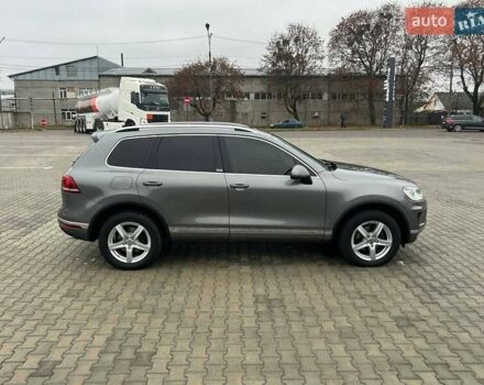 Серый Фольксваген Туарег, объемом двигателя 3 л и пробегом 270 тыс. км за 29999 $, фото 1 на Automoto.ua