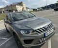 Сірий Фольксваген Туарег, об'ємом двигуна 3 л та пробігом 242 тис. км за 31500 $, фото 1 на Automoto.ua