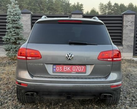 Серый Фольксваген Туарег, объемом двигателя 3.6 л и пробегом 240 тыс. км за 18999 $, фото 2 на Automoto.ua