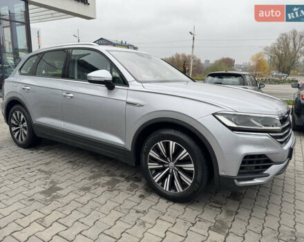 Сірий Фольксваген Туарег, об'ємом двигуна 3 л та пробігом 128 тис. км за 34500 $, фото 4 на Automoto.ua