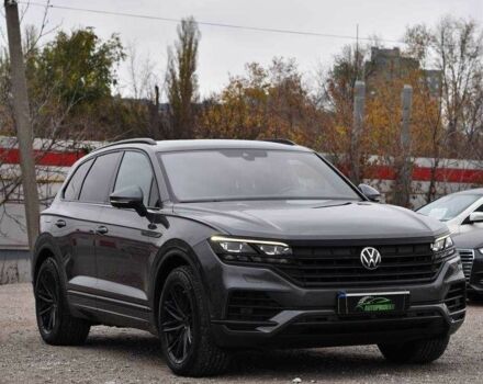 Сірий Фольксваген Туарег, об'ємом двигуна 3 л та пробігом 204 тис. км за 41999 $, фото 2 на Automoto.ua