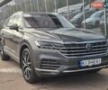 Серый Фольксваген Туарег, объемом двигателя 3 л и пробегом 137 тыс. км за 56900 $, фото 1 на Automoto.ua