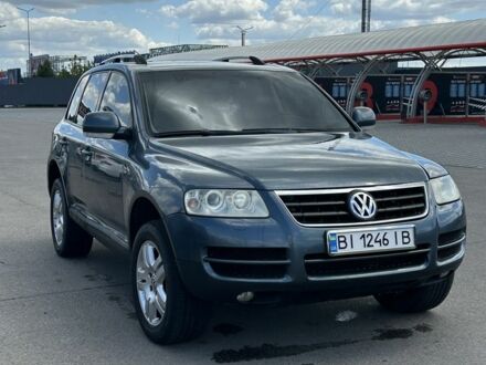 Фольксваген Туарег 2002 у Полтаві на Automoto.ua Сірий Фольксваген Туарег, об'ємом двигуна 3.2 л та пробігом 305 тис. км за 6500 $, фото 1 на Automoto.ua
