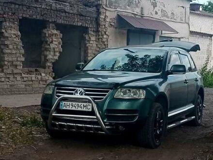 Сірий Фольксваген Туарег, об'ємом двигуна 4.9 л та пробігом 260 тис. км за 6000 $, фото 1 на Automoto.ua