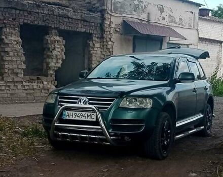 Серый Фольксваген Туарег, объемом двигателя 4.9 л и пробегом 260 тыс. км за 6000 $, фото 1 на Automoto.ua