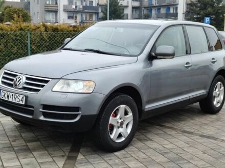 Серый Фольксваген Туарег, объемом двигателя 0 л и пробегом 265 тыс. км за 3500 $, фото 1 на Automoto.ua