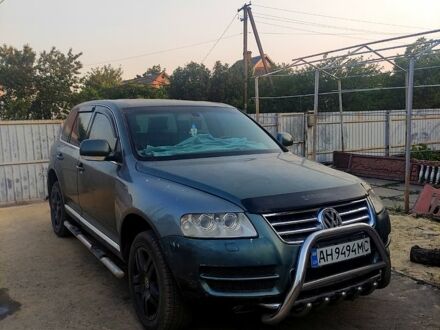 Сірий Фольксваген Туарег, об'ємом двигуна 4.9 л та пробігом 260 тис. км за 6000 $, фото 1 на Automoto.ua