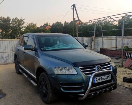 Серый Фольксваген Туарег, объемом двигателя 4.9 л и пробегом 260 тыс. км за 6000 $, фото 1 на Automoto.ua