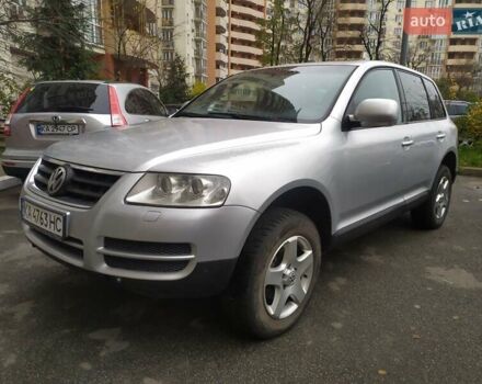Серый Фольксваген Туарег, объемом двигателя 2.46 л и пробегом 300 тыс. км за 7499 $, фото 1 на Automoto.ua