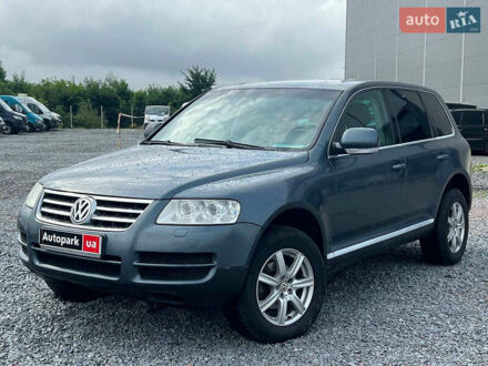 Серый Фольксваген Туарег, объемом двигателя 2.5 л и пробегом 333 тыс. км за 7440 $, фото 1 на Automoto.ua