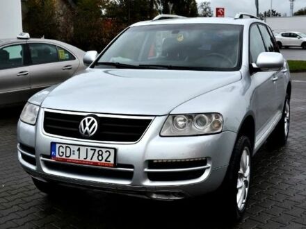 Серый Фольксваген Туарег, объемом двигателя 2 л и пробегом 1 тыс. км за 3200 $, фото 1 на Automoto.ua