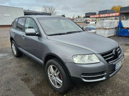 Серый Фольксваген Туарег, объемом двигателя 2.5 л и пробегом 296 тыс. км за 2600 $, фото 1 на Automoto.ua