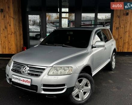 Серый Фольксваген Туарег, объемом двигателя 4.2 л и пробегом 309 тыс. км за 6999 $, фото 1 на Automoto.ua