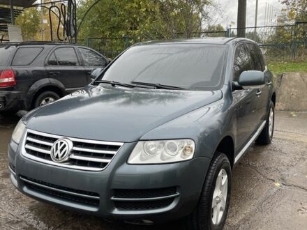 Серый Фольксваген Туарег, объемом двигателя 2.5 л и пробегом 280 тыс. км за 5299 $, фото 1 на Automoto.ua