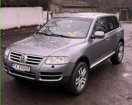 Серый Фольксваген Туарег, объемом двигателя 2.5 л и пробегом 350 тыс. км за 4700 $, фото 1 на Automoto.ua