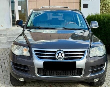 Серый Фольксваген Туарег, объемом двигателя 3 л и пробегом 213 тыс. км за 3455 $, фото 1 на Automoto.ua
