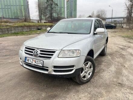 Сірий Фольксваген Туарег, об'ємом двигуна 3 л та пробігом 340 тис. км за 5500 $, фото 1 на Automoto.ua