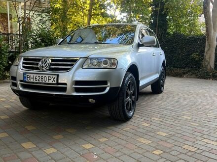 Серый Фольксваген Туарег, объемом двигателя 3 л и пробегом 333 тыс. км за 8200 $, фото 1 на Automoto.ua