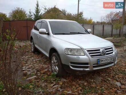 Серый Фольксваген Туарег, объемом двигателя 3.2 л и пробегом 390 тыс. км за 4300 $, фото 1 на Automoto.ua