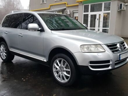Сірий Фольксваген Туарег, об'ємом двигуна 3.2 л та пробігом 235 тис. км за 7800 $, фото 1 на Automoto.ua