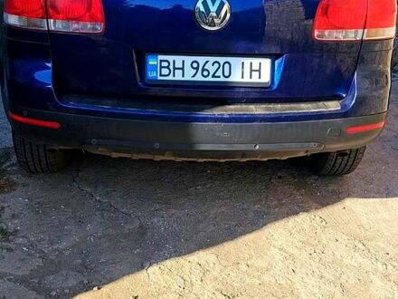 Серый Фольксваген Туарег, объемом двигателя 3 л и пробегом 200 тыс. км за 6000 $, фото 1 на Automoto.ua