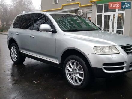 Сірий Фольксваген Туарег, об'ємом двигуна 3.2 л та пробігом 235 тис. км за 7500 $, фото 1 на Automoto.ua