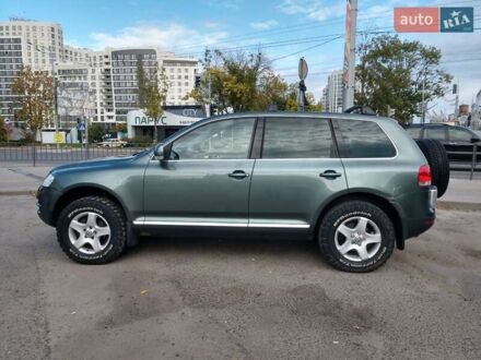 Сірий Фольксваген Туарег, об'ємом двигуна 2.5 л та пробігом 316 тис. км за 12500 $, фото 1 на Automoto.ua